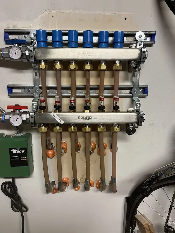 Plumber performing Water Heater Repair at a residential property in Church Hill